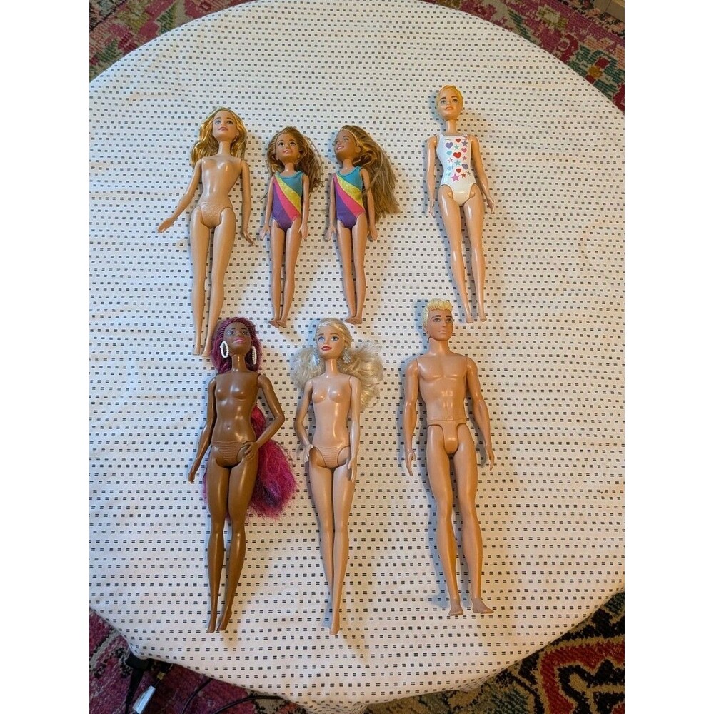 Lot Of 7 Barbie/Ken Dolls No Clothes Or Shoes